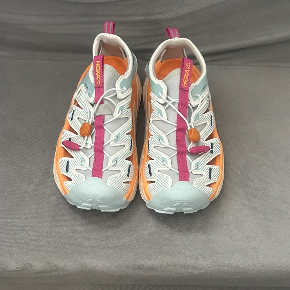 Trail/ Hiking sandals with orange and magenta highlights.  Excellent condition